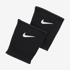 two black wristbands with white nike logo