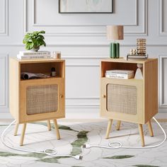 two wooden side tables with books and plants on them in front of a white wall