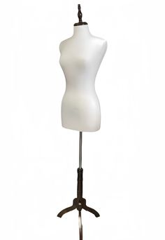 a white mannequin on a metal stand