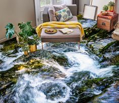 a living room with water flowing down the floor