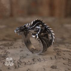 Ignite your passion for fantasy with our handcrafted Dracarys Ring, a stunning piece of 925 sterling silver jewelry that captures the essence of mythical creatures. This unique ring is not only a perfect gift for dragon lovers but also an enchanting statement piece that invites compliments--embrace your whimsical side and add it to your collection today!Elevate your accessory game with our handcrafted Dragon 925 Sterling Silver Ring, designed for those who appreciate the enchantment of mythical Fantasy Jewelry Ring, Dragon Wedding Ring, Prince Rhaegar Targaryen, Fantasy Rings, Targaryen Princess, Rhaegar Targaryen, Princess Elena, Cool Rings, Viking Ring