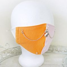 New Handmade Cotton Two-Tone Face Mask With Cat Charm, Rhinestones, And Detachable Chain. Charm Is Connected To The Chain And Can Be Removed As Well. Washable, Non-Medical Grade. Made In The Usa. - 100% Cotton - Double Layered - Stretchy Elastic Ear Loops - Fits Most Adults/Teens - One Size (4.5 In. X 7.25 In.) - Care Instructions: Remove Charm And Chain Prior To Washing. Machine Handwash Or Delicate Cycle. Hang To Dry. *Due To Sanitary Reasons, Face Masks Cannot Be Returned Mardi Gras Halloween Costume, Bubble Face Mask, Owl Mask, Tone Face, Tie Dye Bandanas, Cat Face Mask, Mask Masquerade, Alley Cat, Skulls And Roses