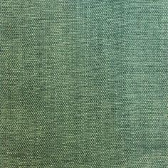 an old green cloth textured with small dots and lines, as well as the background