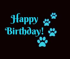 a happy birthday card with blue paw prints