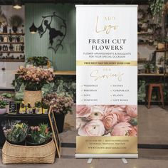 a sign advertising fresh cut flowers in a flower shop