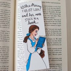 a bookmark with an image of a woman reading a book