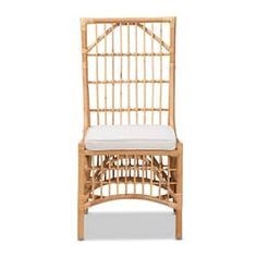 a bamboo chair with a cushion on it