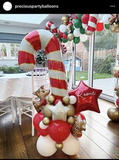 balloons and decorations in the shape of candy canes