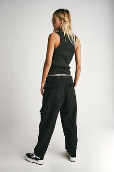 Just as comfy as they are effortless to style, these slouchy pants are featured in a low-rise, cargo-inspired silhouette with utility pockets throughout for added dimension. * Button fly closure* Oversized pouch pockets* Harem-inspired dropped crotch Slouchy Pants, Smaller Hips, Free People Style, Utility Pockets, Black Fits, Boho Clothing, Boho Outfits, Pocket Pouch, Casual Chic