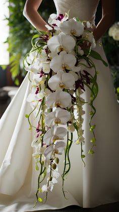 Stunning Cascade Orchid Bridal Bouquets Orchid Cascading Bouquet, Cascading White Orchid Bridal Bouquet, Expensive Wedding Bouquet, Waterfall Bouquet Orchid, Diy Cascading Bridal Bouquets Fake Flowers, Waterfall Flower Bouquet, Wedding Bouquets Orchids And Roses, Orchid Calla Lily Bouquet, Foliage Wedding Bouquet