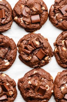 chocolate cookies with white and brown crumbles on top