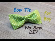 a green bow tie with white polka dots on it and the words bow tie for boy