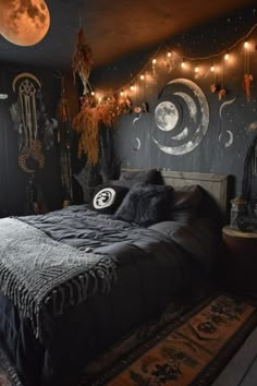 a bed room with a neatly made bed and hanging decorations