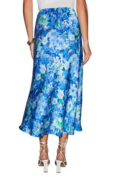 A vintage-look floral print brightens a supple satin midi skirt that's perfect for a garden party. Hidden side-zip closure 100% polyester Hand wash, dry flat Imported Silk Midi Skirt For Spring, Satin Flared Skirt For Spring, Spring Silk Midi Skirt, Flowy Satin Skirt For Spring, Blue Skirt For Spring Garden Party, Spring Silk Flared Skirt, Flowy Silk Skirt For Spring, Spring Flowy Satin Skirt, Silk Flowy Skirt For Spring