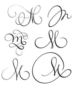 the letter m and w in cursive handwriting