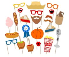 an assortment of photo props including hot dogs, hamburgers and other foods on sticks