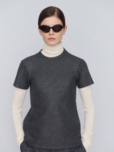 Short sleeved top Elegant Short Sleeve Cashmere Top, Fitted Short Sleeve Cashmere Tops, Modern Long Sleeve Wool Tops, Classic Wool Tops For Workwear, Modern Wool Top For Workwear, Wool Crew Neck Tops For Layering, Fitted Gray T-shirt For Fall, Relaxed Fit Turtleneck Cashmere Top, Relaxed Fit Cashmere Turtleneck Top