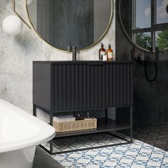 a bathroom with a sink, mirror and bathtub in the corner next to it