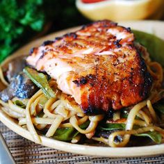 a close up of a plate of food with noodles