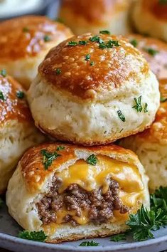 Garlic Parmesan Cheeseburger Bombs are cheesy, savory snacks wrapped in golden biscuit dough. Try this easy recipe today! Dessert Salad Recipes, Seasoned Ground Beef, Ribeye Steak Recipes, Cheese All, Bombe Recipe, Baked Bacon, Biscuit Dough, Buttery Biscuits, Grandmas Recipes