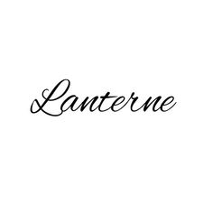 the word lanterne written in cursive writing on a white background with black ink