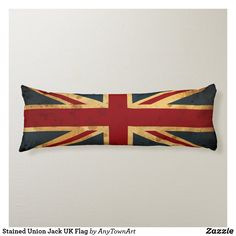 a pillow with the flag of great britain on it's front and back sides