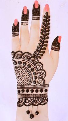 hendi design on the palm of a woman's hand