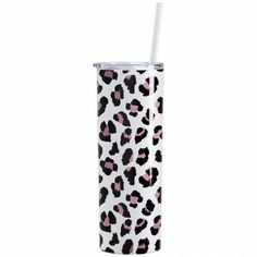 a pink and black leopard print tumbler with a straw