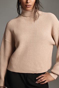 Has sweater weather ever looked (and felt) this good? The Good American Cozy Ribbed Turtleneck features a slightly oversized fit and a rolled turtleneck design, rendered in a plush knit fabric. | Cozy Ribbed Turtleneck Sweater by Good American in White, Women's, Size: Medium, Polyester/Nylon/Viscose at Anthropologie Fall Turtleneck With Ribbed Cuffs For Cold Weather, Chic Chunky Knit Turtleneck For Winter, Cozy Fall Turtleneck With Relaxed Fit, Cozy Fall Turtleneck In Relaxed Fit, Chic Chunky Knit Winter Turtleneck, Cozy Relaxed Fit Turtleneck For Fall, Cozy Turtleneck With Funnel Neck For Fall, Beige Ribbed Turtleneck For Winter, Relaxed Fit Turtleneck For Winter