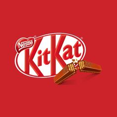 a kitkat logo on a red background with two pieces of chocolate in the foreground