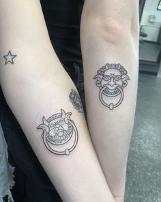 two people with matching tattoos on their arms