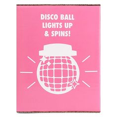 disco ball lights up and spins pink notebook with white lettering on the front cover that says disco ball lights up & spins