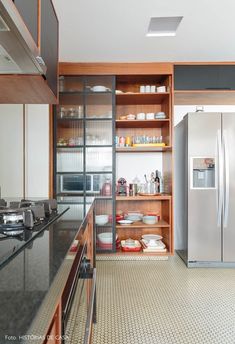 the kitchen is clean and ready to be used as a storage area for food items