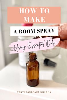 a person holding a bottle with the words how to make a room spray using essential oils