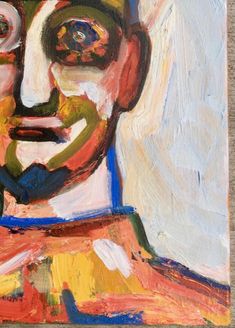 an abstract painting of a man's face