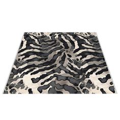 an animal print area rug with black and white stripes on it's edges, in front of a white background