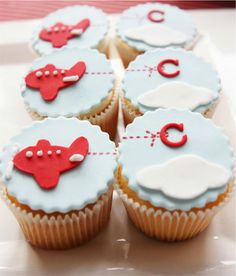 cupcakes decorated with red and white icing