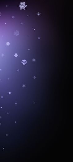 the snowflakes are falling down on the dark background with purple and blue hues