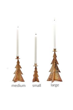 three candles with different types of christmas trees on them and the words medium, small, large