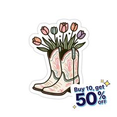 a pair of cowboy boots with flowers in the boot sticker on white background for sale