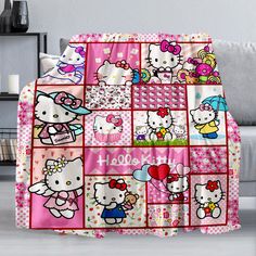 a blanket with hello kitty pictures on it