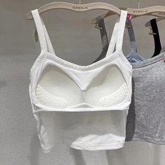 This women's built-in bra cropped tank top is the perfect versatile top for any occasion. The soft, stretchy fabric provides a comfortable fit, while the built-in bra offers light support. The cropped style is flattering on all body types, and the four stylish colors (blue, white, black, and grey) make it easy to match with any outfit. Features: Built-in bra for light support Soft, stretchy fabric for a comfortable fit Cropped style Available in four colors: blue, white, black, and grey Benefits Crop Top Women, Tube Tops, Fashion Female, Tank Top Bras, Tops Fashion, Fall Fits, Sleeveless Tops, Solid Clothes, Basic T Shirt