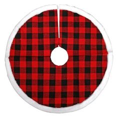 a red and black buffalo plaid christmas ornament hanging on a white background with a circular hole in the center