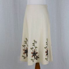 Carole Little Linen Blend Embellished Gored Skirt. Natural Beige Linen Flared A-Line Embellished Skirt. Brown Flower Embroideries With Coral Beads And Spring Green Glass Beads 55% Linen, 45% Rayon Fully Lined, Full Sweep. Falls Below The Knees Vintage Skirt, No Sign Of Wear. Looks New. Size 8 Medium Measures: Length: 25" Waist 32" Hips: 44" Gored Skirt, Embellished Skirt, Brown Flower, Embroidered Linen, Coral Beads, Spring Green, Flared Skirt, Vintage Skirt, Embroidery Flowers