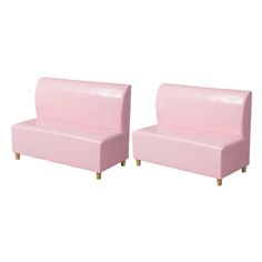 two pink benches sitting next to each other