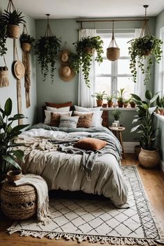 a bedroom with plants hanging on the wall