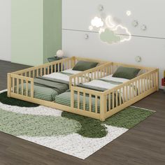 a baby's room with two wooden cribs on the floor