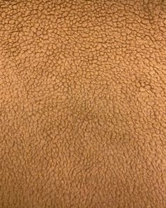 the texture of an animal's fur is brown