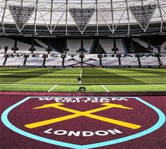 an empty stadium with the words west ham and london on it
