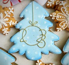 decorated cookies in the shape of a christmas tree